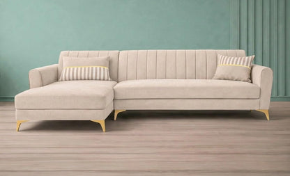Adorn India Premium Luster 8 Seater L Shape Sofa Set with 2 Puffy & 1 Center Table | Velvet Suede Fabric | 3-Year Warranty | LHS | Cream with Golden Legs & Striped Pattern Cushion